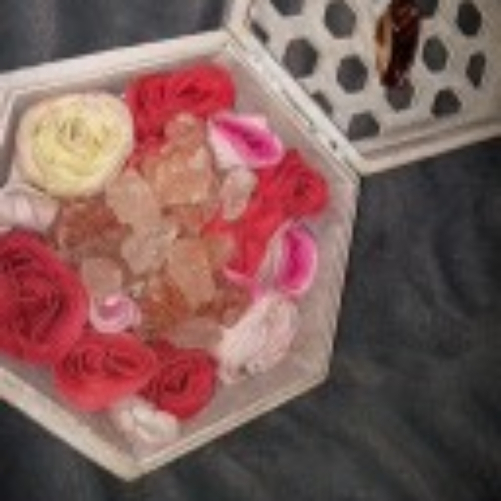 Bath salt rocks and rose petal soap flakes